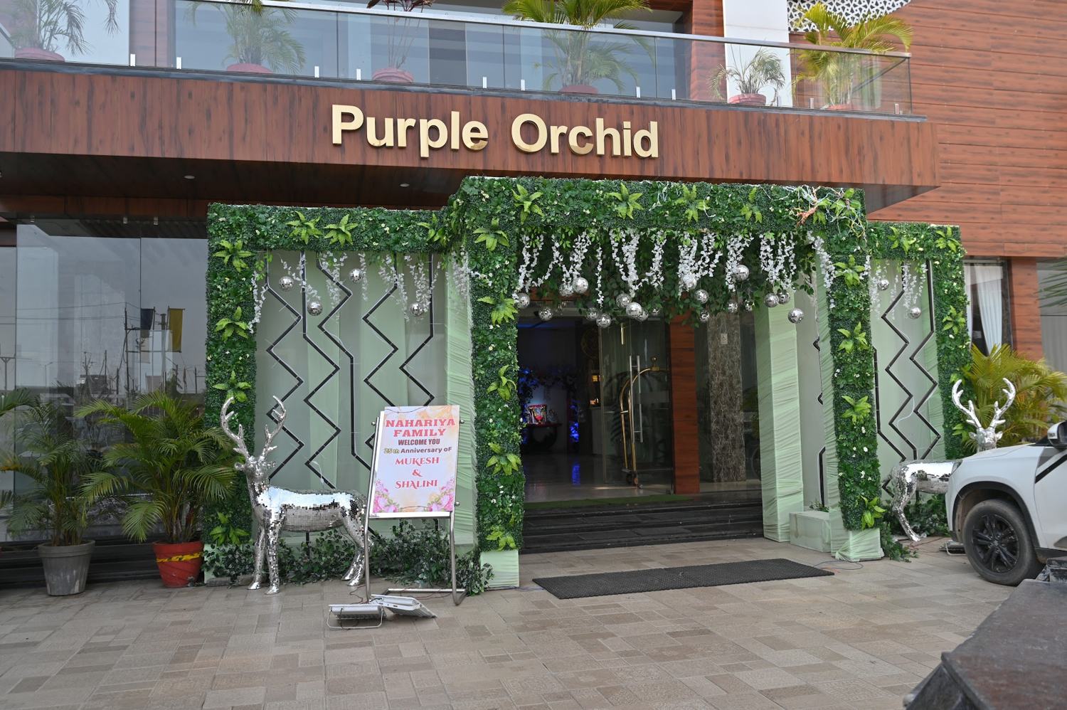 Restaurant entrance with Purple Orchid signage